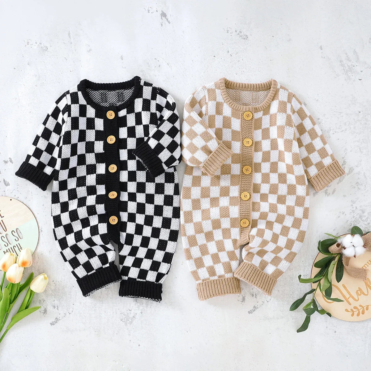 Black and beige checkered baby romper with wooden buttons for infants 0-12 months