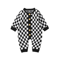 Black and white checkered baby romper with long sleeves and wooden buttons for infants