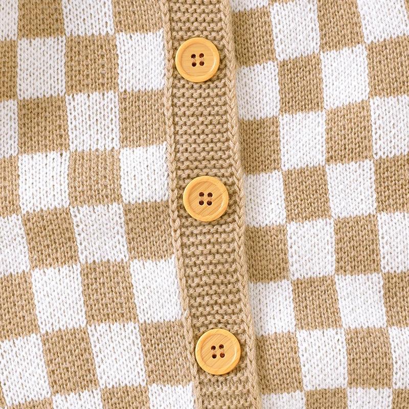 beige and white checkered baby romper knit fabric with wooden buttons for infants