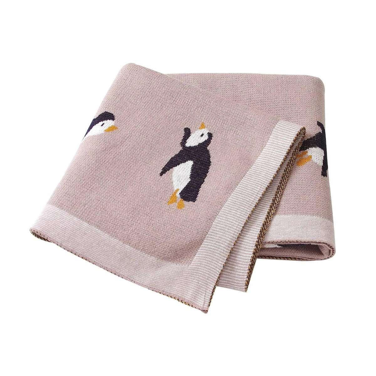 Childrens knit penguin blanket in soft pink for babies and kids with cute penguin design
