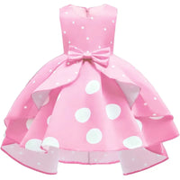 Pink girls childrens party dress with white polka dots and bow for toddlers and kids