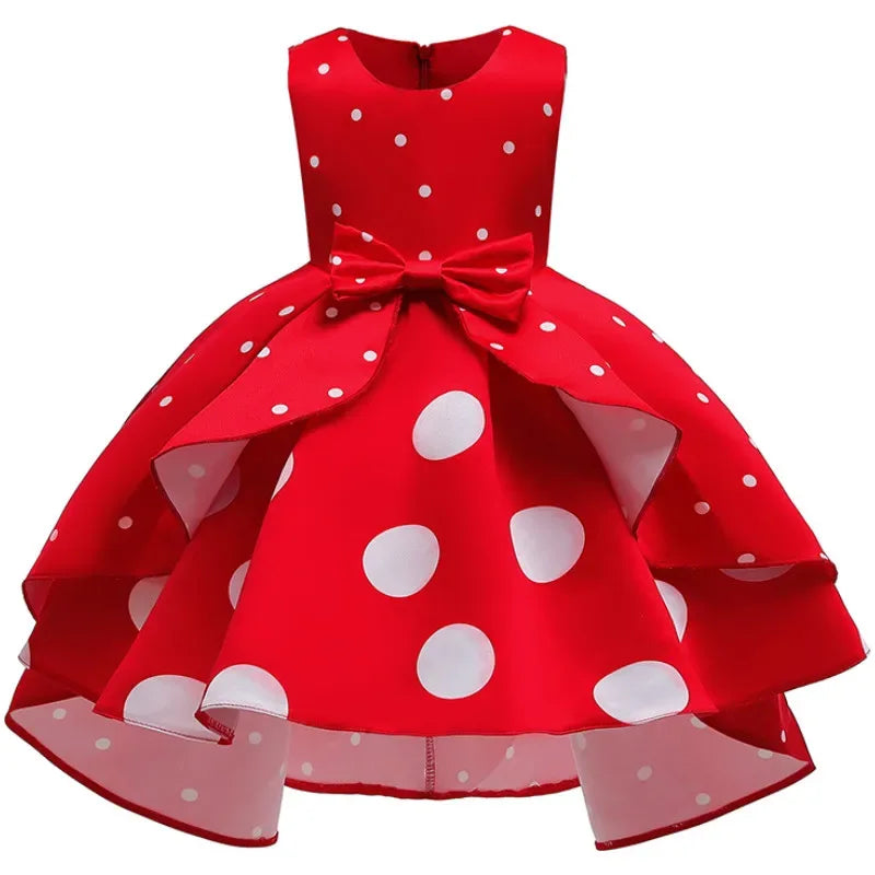 Red sleeveless childrens party dress with white polka dots and bow for girls