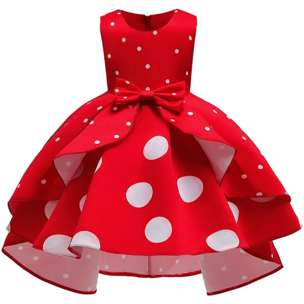 Red sleeveless childrens party dress with white polka dots and bow for girls
