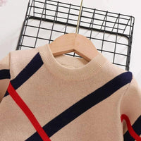 Beige children's preppy pullover for kids with navy and red diagonal stripes, crew neck