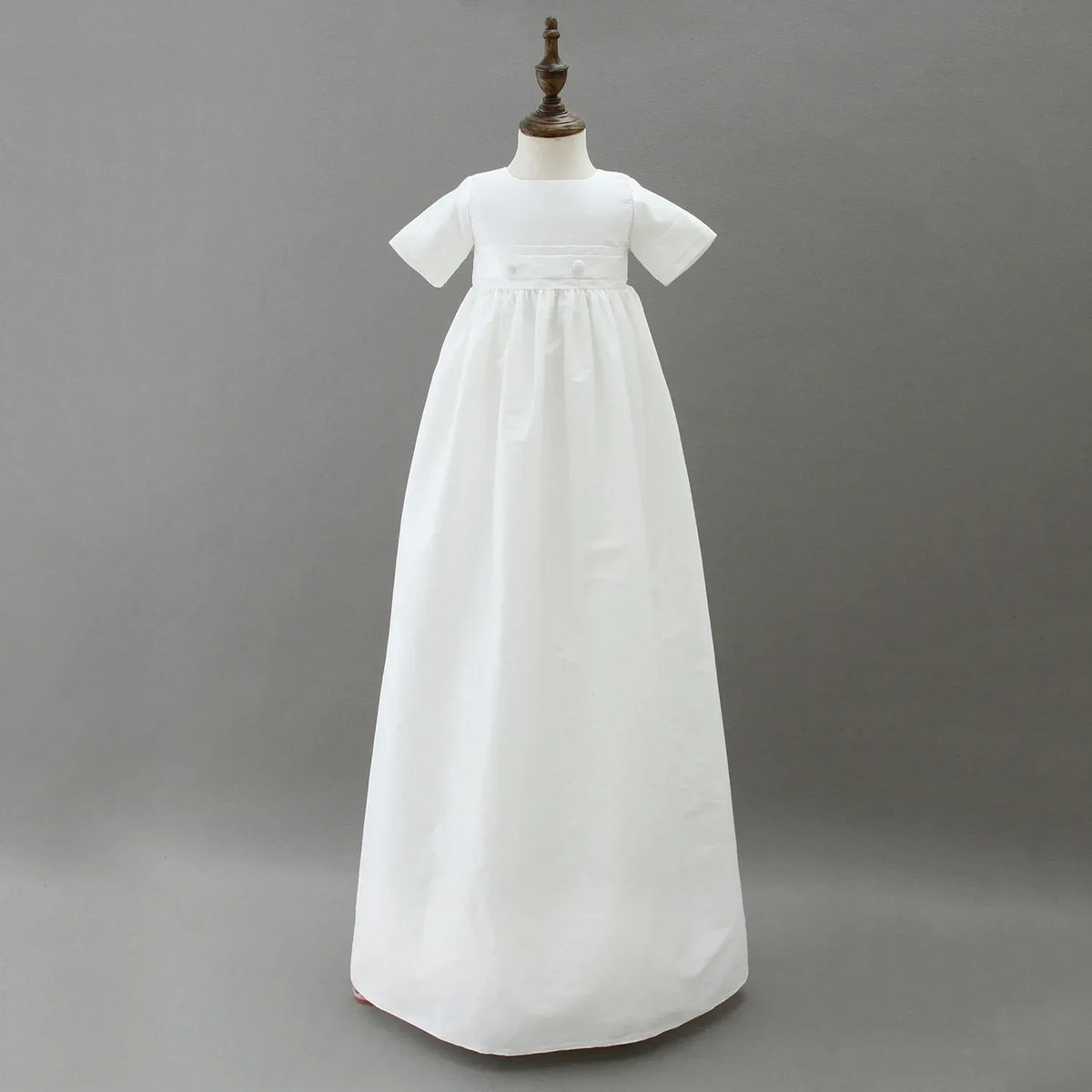 White christening gown for boys with short sleeves and delicate trim, newborn to toddler size