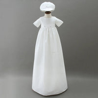 white christening gown for boys with short sleeves and matching white hat for infants