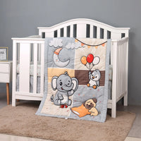 Baby comfort set featuring gray elephant, owl with balloons, and sleeping pug blanket draped over white crib