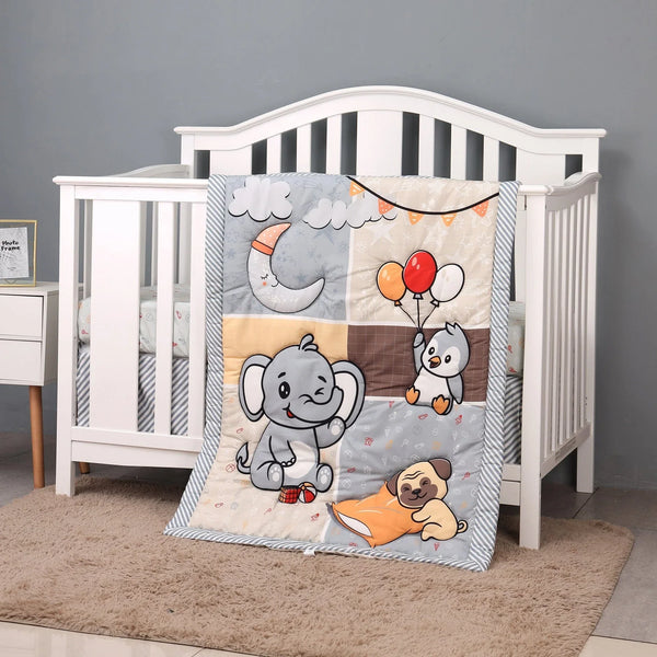 Baby comfort set featuring gray elephant, owl with balloons, and sleeping pug blanket draped over white crib