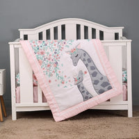 baby girl pink giraffe comfort set blanket with floral design and matching crib bedding