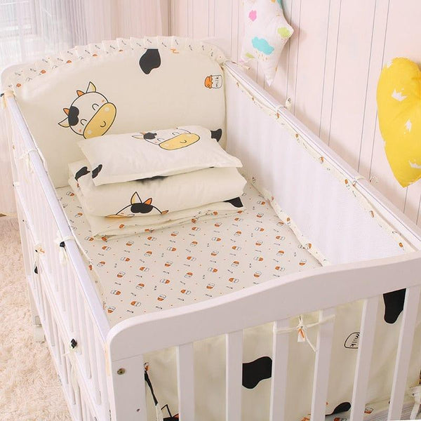 Cream cotton baby crib bedding set with cute cow prints for infants and toddlers