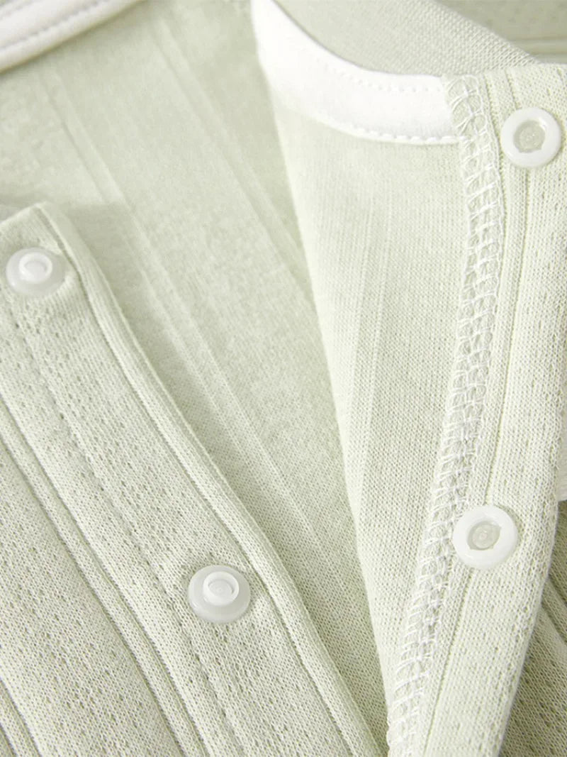Light green cotton baby romper long sleeve with snap buttons for infants