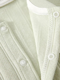 Light green cotton baby romper long sleeve with snap buttons for infants