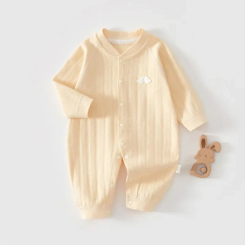 cream cotton baby romper long sleeve for newborns with ribbed texture and cloud applique
