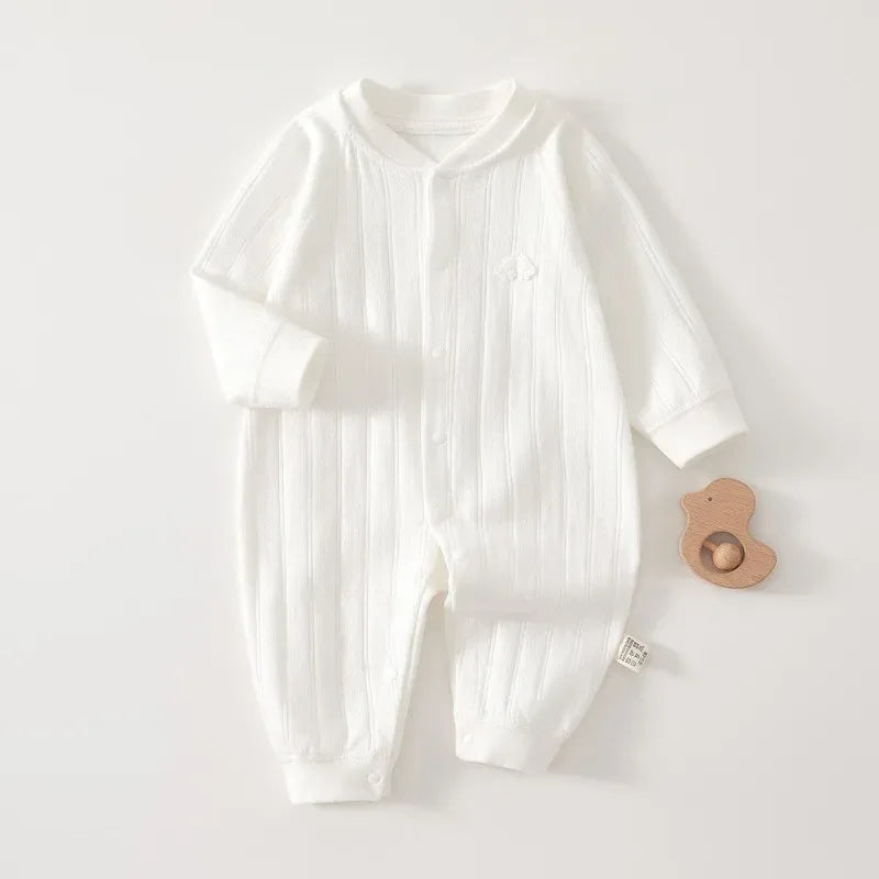 white cotton baby romper long sleeve for newborn with ribbed texture and snap buttons