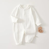 white cotton baby romper long sleeve for newborn with ribbed texture and snap buttons