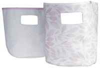 Set of white and light pink fabric baby storage bins with leaf pattern and cutout handles