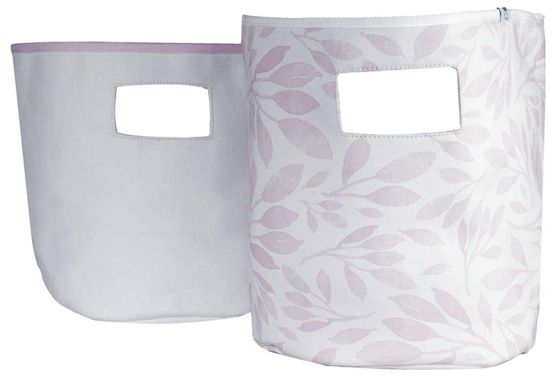 Set of white and light pink fabric baby storage bins with leaf pattern and cutout handles