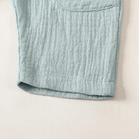 Light blue cotton kids overalls romper for toddlers with textured fabric detail