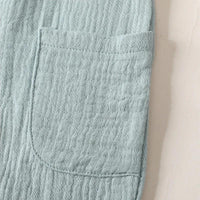light blue cotton kids overalls romper pocket detail soft textured fabric