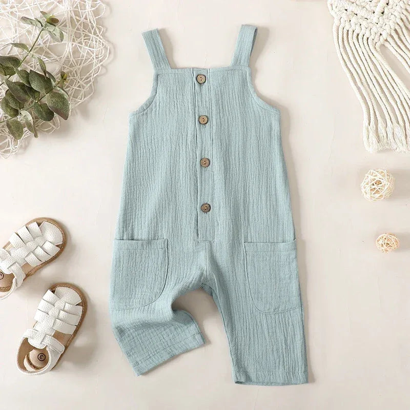 Light blue cotton kids overalls romper for toddlers with front wooden buttons and pockets
