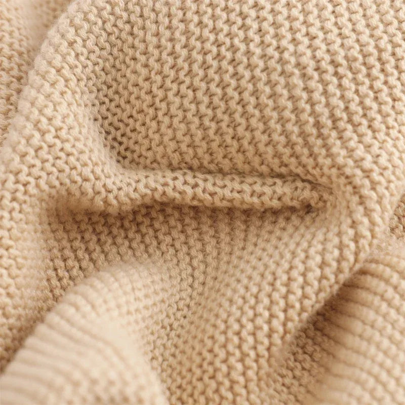 beige cotton soothing cloth toy for toddlers with soft textured knit fabric for babies and kids