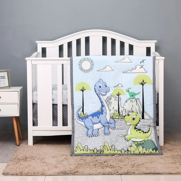 Blue and green dinosaur themed crib bedding for babies with cartoon design and playful scenery