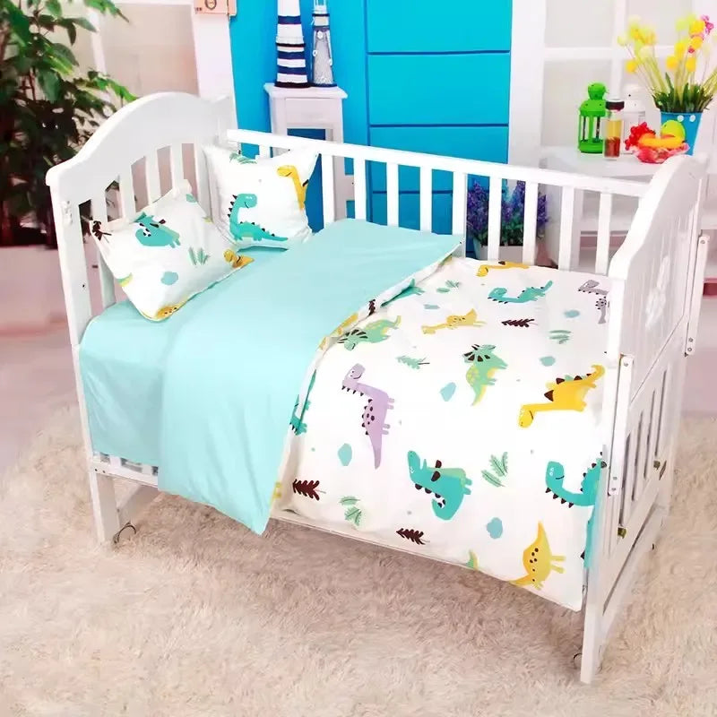 White baby crib with colorful dinosaur print crib bedding set for infants and toddlers