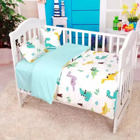 White baby crib with colorful dinosaur print crib bedding set for infants and toddlers