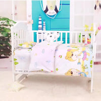 White baby crib with colorful cartoon bear crib bedding set suitable for infant nursery