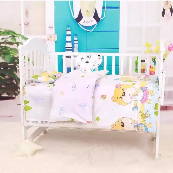 White baby crib with colorful cartoon bear crib bedding set suitable for infant nursery