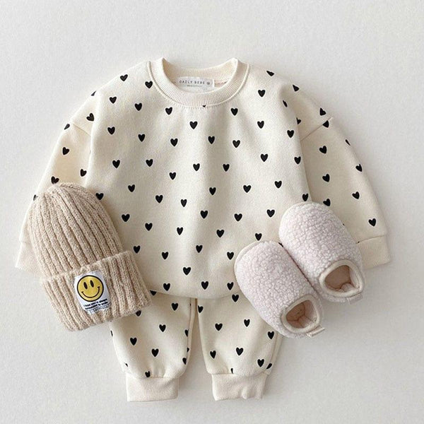babies cream warm up set with black heart print long sleeve sweatshirt and pants