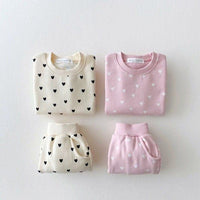 Babies warm up set in cream and pink with heart prints, long sleeve tops and pants for toddlers