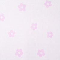Light lavender jacquard knit fabric featuring scattered soft pink five-petal daisy flowers with white centers and fine knit