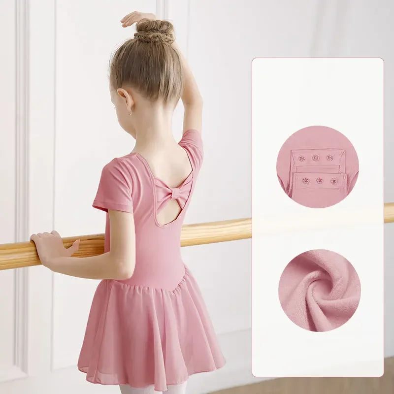 girls pink dance dress with short sleeves bow back detail size 4 to 6