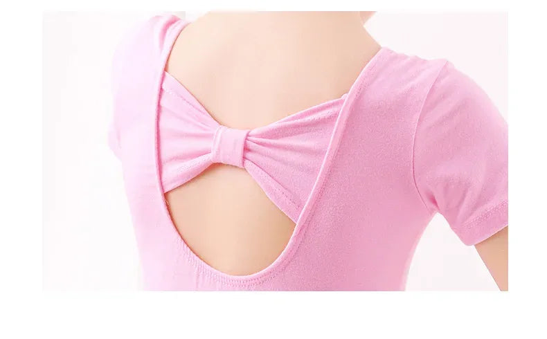 girls pink dance dress with short sleeves and bow detail on back, toddler size