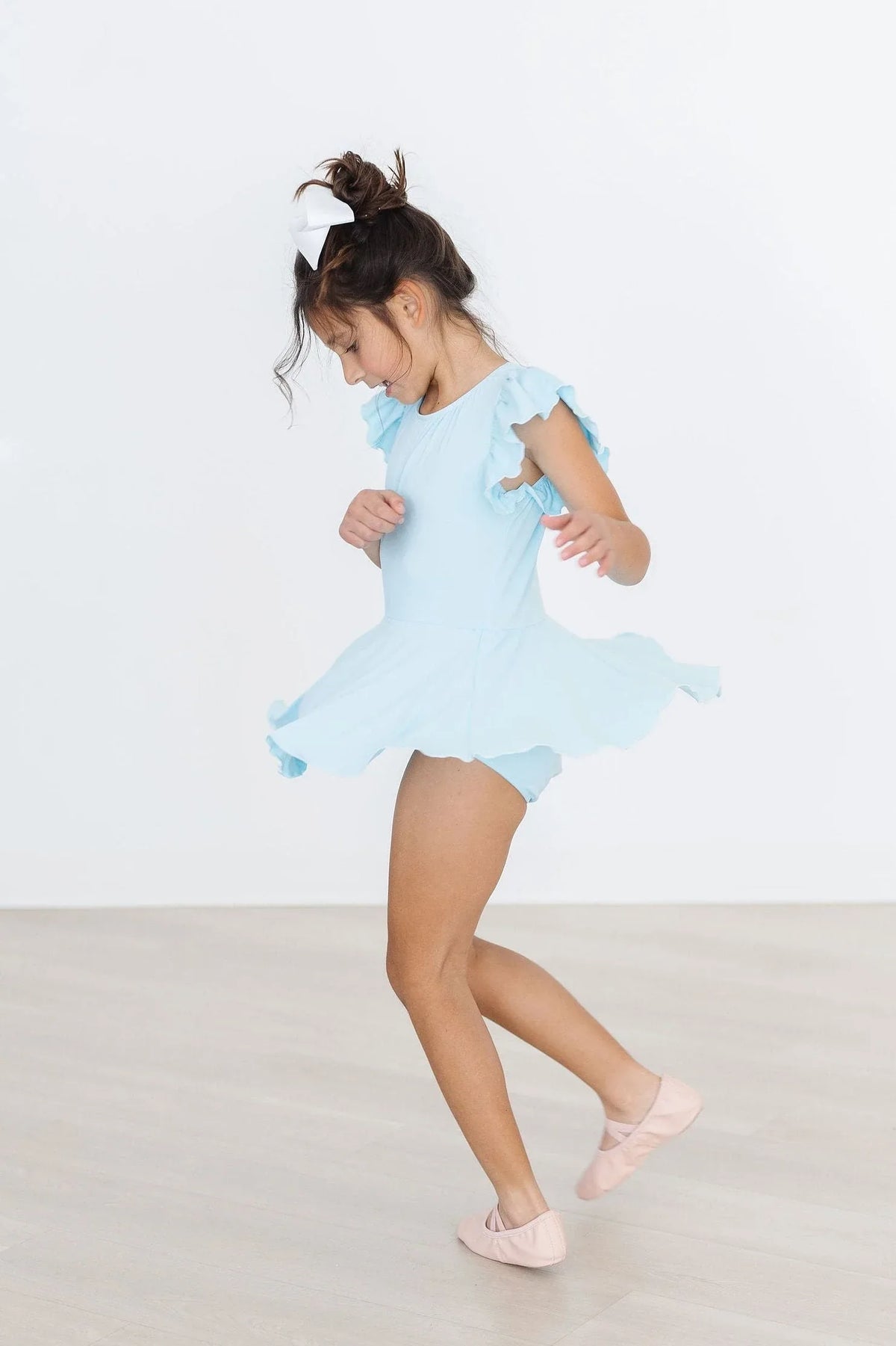 Girls light blue Twirl dance leotard short sleeve with ruffle details by Mila & Rose