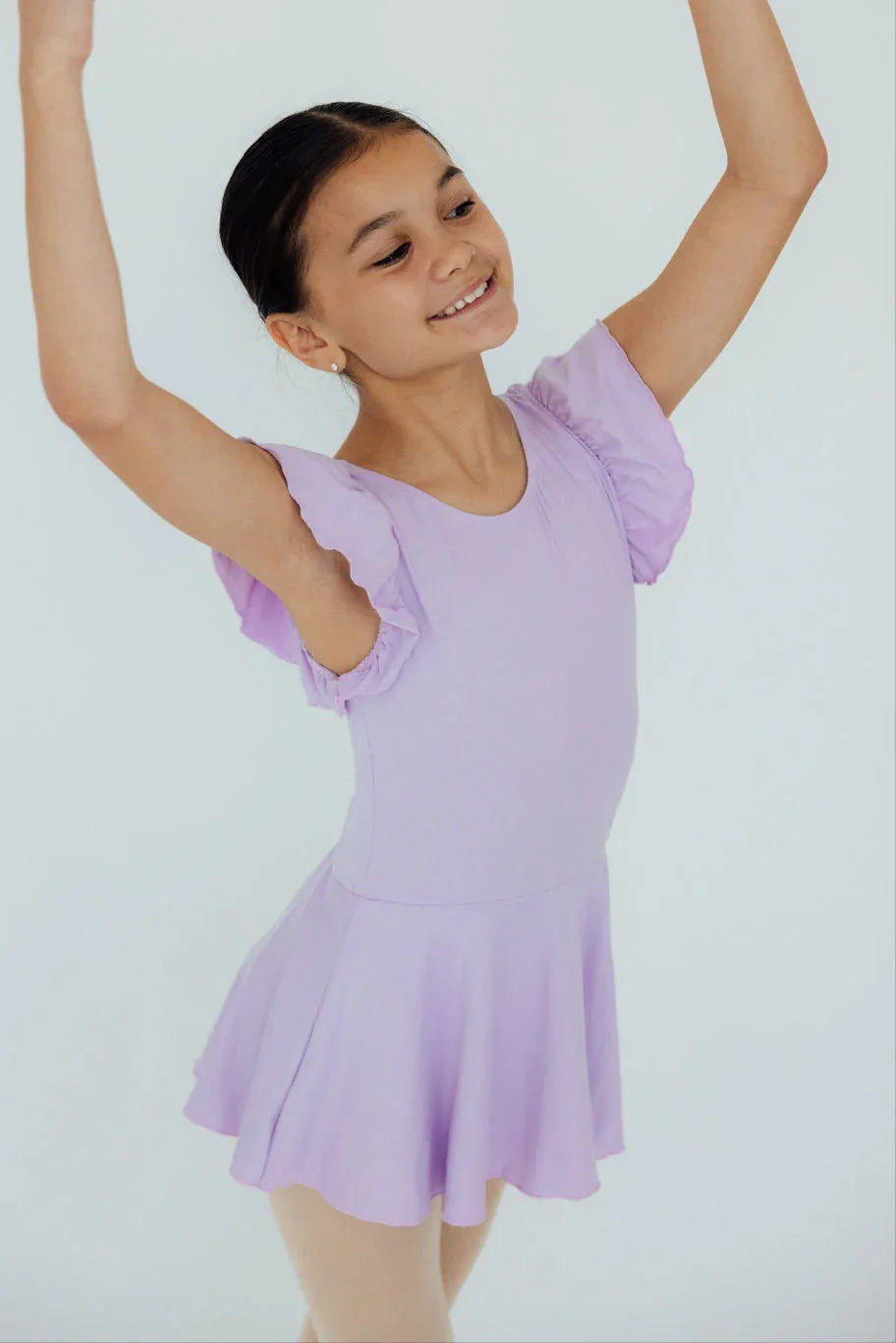 Girls lavender short sleeve twirl dance leotard with ruffle detail by Mila & Rose