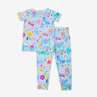 Light blue two-piece short-sleeve pajama set for parents with pastel floral and dragonfly print, Deep Breath motif.