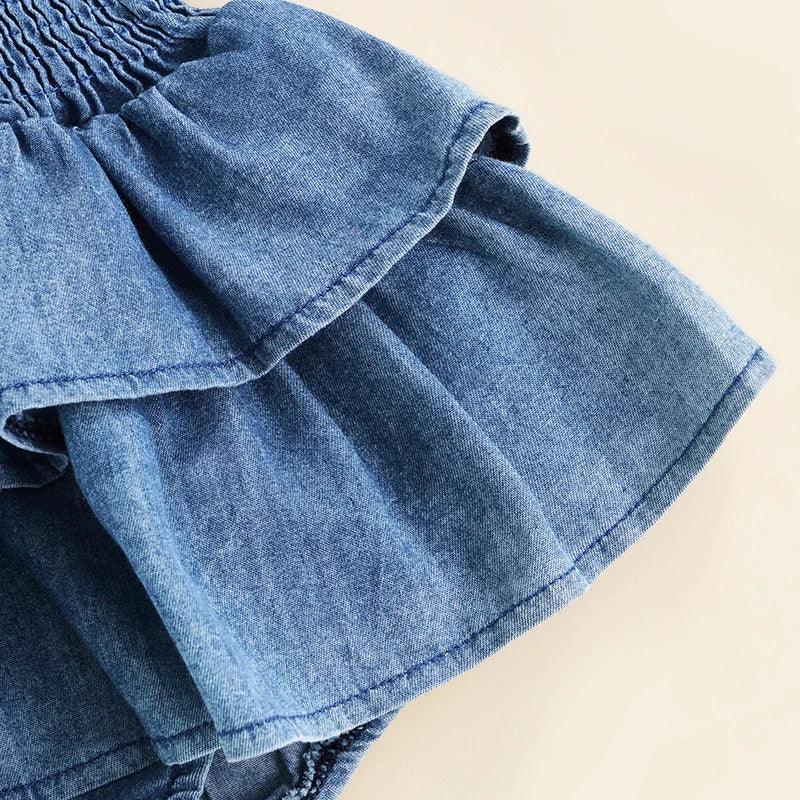 Denim blue baby romper for 3-6 months with ruffled layered skirt detail
