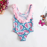 blue dessert themed baby swimsuit with pink watermelon print and pink ruffle trim for infants