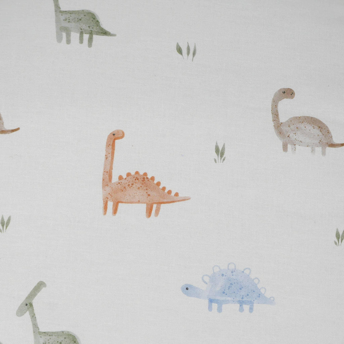 Goosewaddle dinosaur pouf fabric with pastel colored dinosaurs on white background for baby nursery