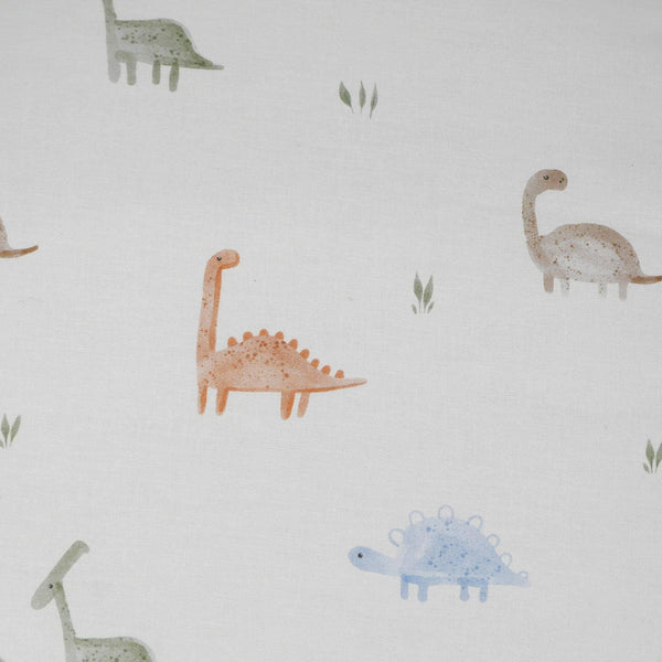 Goosewaddle dinosaur pouf fabric with pastel colored dinosaurs on white background for baby nursery