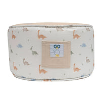 Round toddler dinosaur pouf in beige with colorful dinosaur print and small bird patch