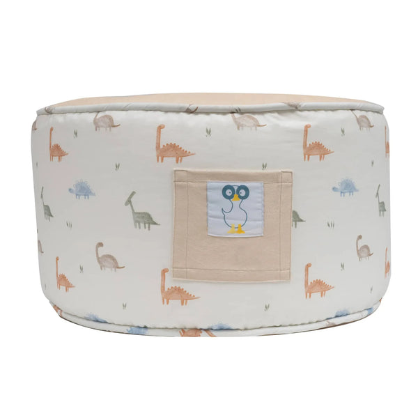 Round toddler dinosaur pouf in beige with colorful dinosaur print and small bird patch