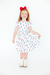 Girls white twirl dress for the summer with colorful popsicle print and flutter sleeves