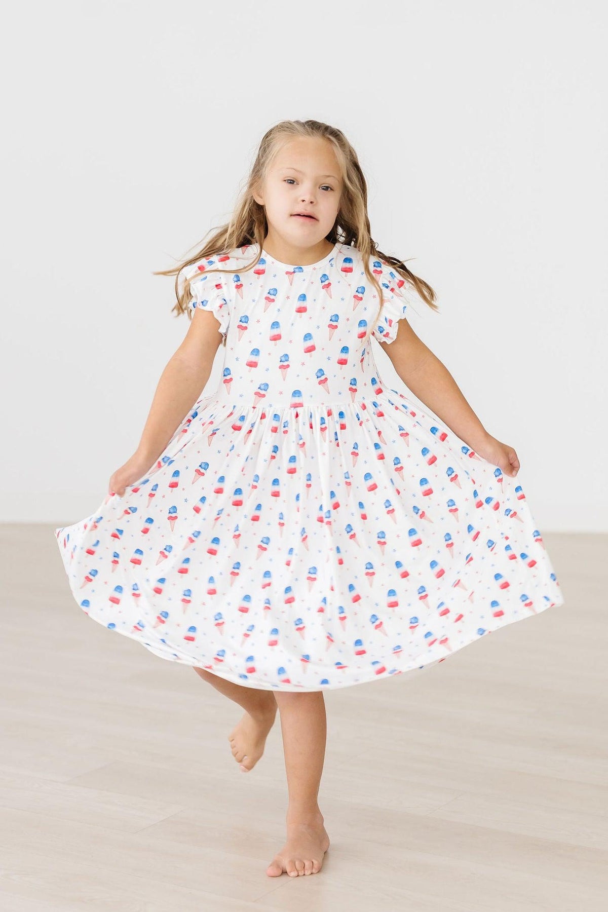 girls white twirl dress with red and blue print flutter sleeves dress for the summer