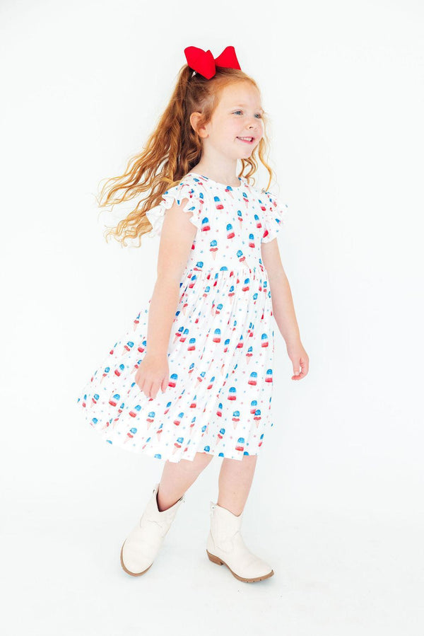 Girls white twirl dress for the summer with colorful popsicle print and flutter sleeves