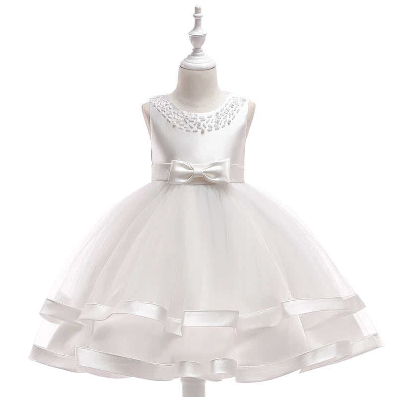 White sleeveless babies special occasion dress with bow and beaded neckline perfect dress for wedding party guest