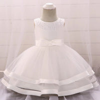 White babies special occasion dress for wedding party guest with beaded neckline and bow