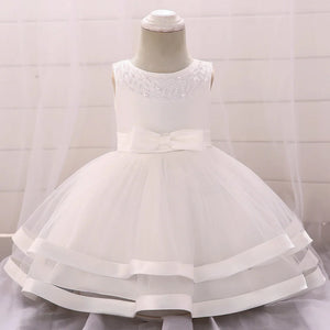 White babies special occasion dress for wedding party guest with beaded neckline and bow